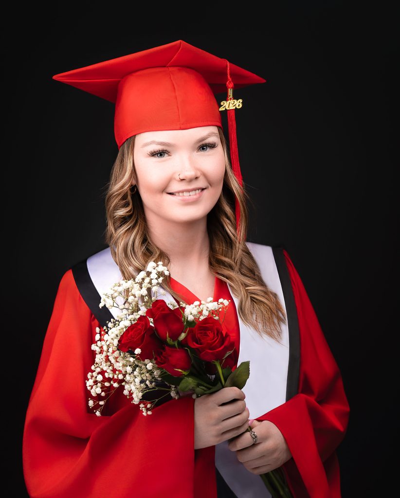 A studio portrait of a professional graduation headshot.