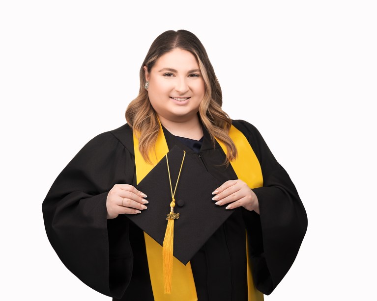 A studio portrait of a professional business headshot.